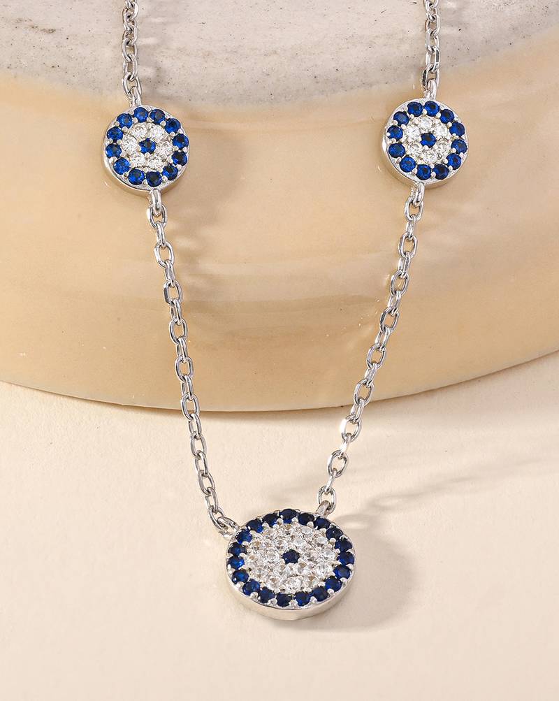 Floral blue stone silver necklace with circular flowers and statement detail