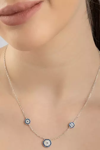 Floral blue stone silver necklace with circular flowers and statement detail