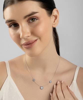 Floral blue stone silver necklace with circular flowers and statement detail 4