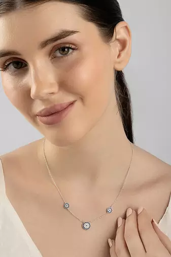 Floral blue stone silver necklace with circular flowers and statement detail
