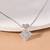 Petal-shaped cz silver necklace with four-leaf design and delicate sparkle