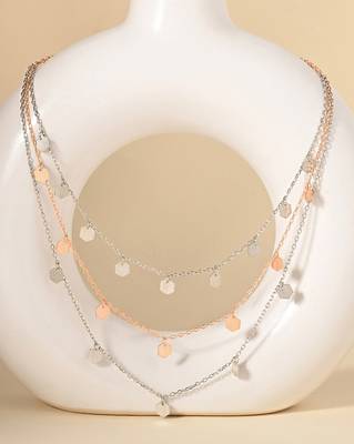 Triple layered heart charm necklace with gold chain accent and romantic touch 1