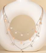 Triple layered heart charm necklace with gold chain accent and romantic touch