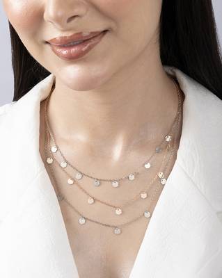 Triple layered heart charm necklace with gold chain accent and romantic touch 2