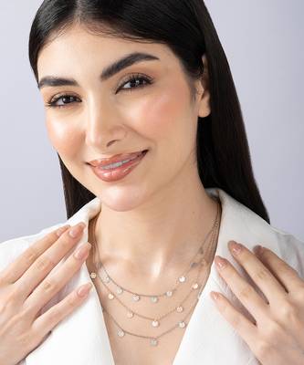 Triple layered heart charm necklace with gold chain accent and romantic touch 3