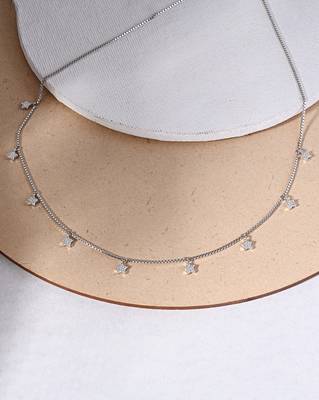 Star charm silver necklace with cube chain and everyday celestial look 1