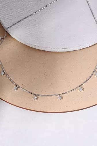 Star charm silver necklace with cube chain and everyday celestial look