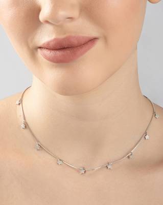 Star charm silver necklace with cube chain and everyday celestial look 2