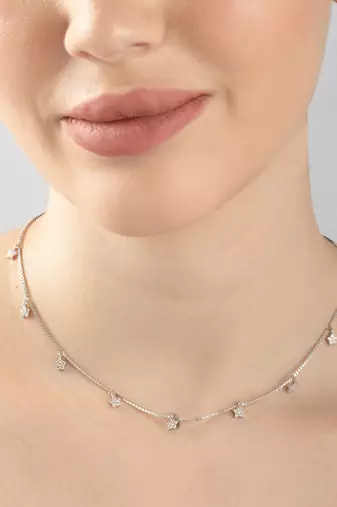 Star charm silver necklace with cube chain and everyday celestial look