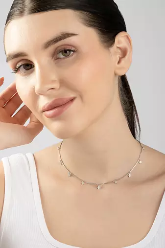 Star charm silver necklace with cube chain and everyday celestial look