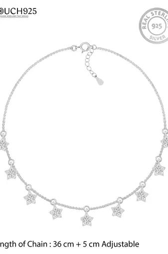 Star charm silver necklace with cube chain and everyday celestial look