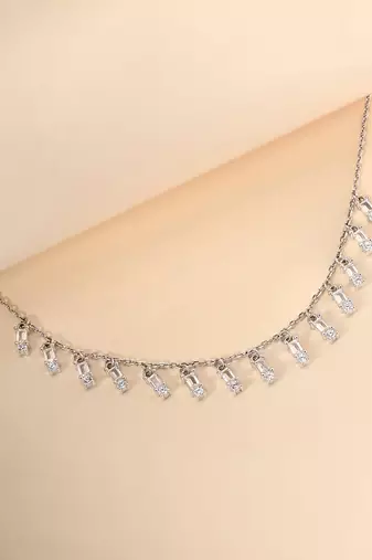 Multi-charm cz silver necklace with beads and playful detail