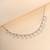 Multi-charm cz silver necklace with beads and playful detail