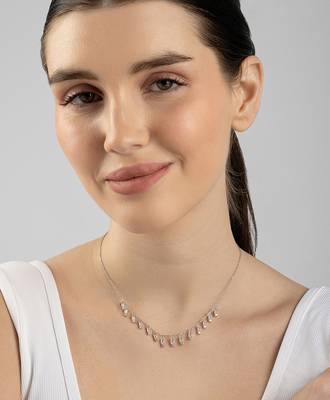 Multi-charm cz silver necklace with beads and playful detail 2