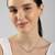 Multi-charm cz silver necklace with beads and playful detail