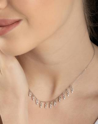 Multi-charm cz silver necklace with beads and playful detail 3