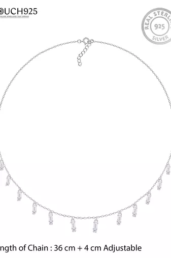 Multi-charm cz silver necklace with beads and playful detail