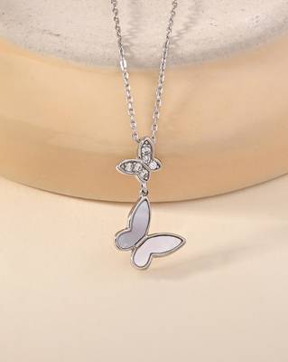 Butterfly double charm silver necklace with symbol of transformation and grace 1