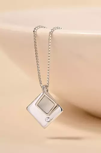Dual pendant four-shape silver necklace with overlapping design and daily wear appeal