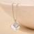 Dual pendant four-shape silver necklace with overlapping design and daily wear appeal