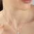 Dual pendant four-shape silver necklace with overlapping design and daily wear appeal