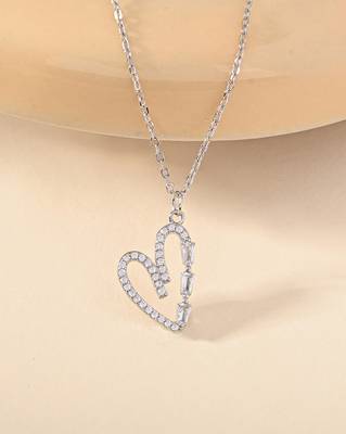 Heart-shaped cz silver pendant necklace with trailing stones and romantic vibe 1
