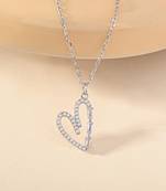 Heart-shaped cz silver pendant necklace with trailing stones and romantic vibe