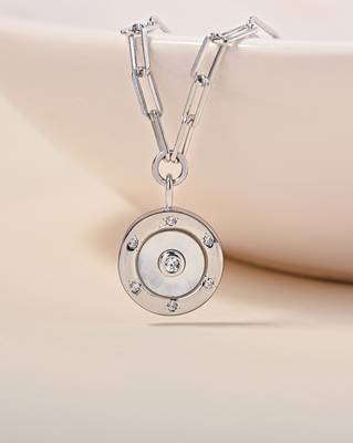 Hexagon cz cluster silver necklace with circular design and radiant center stone 1