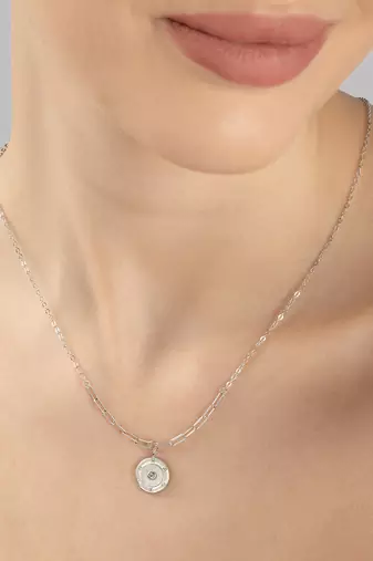Hexagon cz cluster silver necklace with circular design and radiant center stone