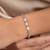 Beaded charm silver bracelet