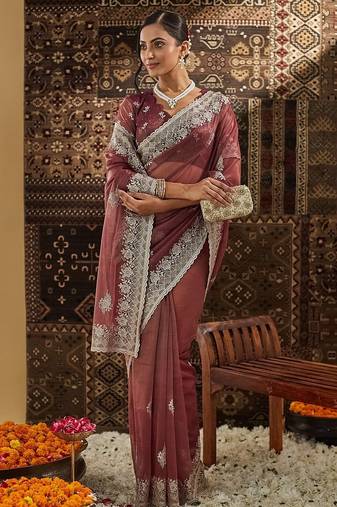 Rust beads and stones embellished supernet designer saree