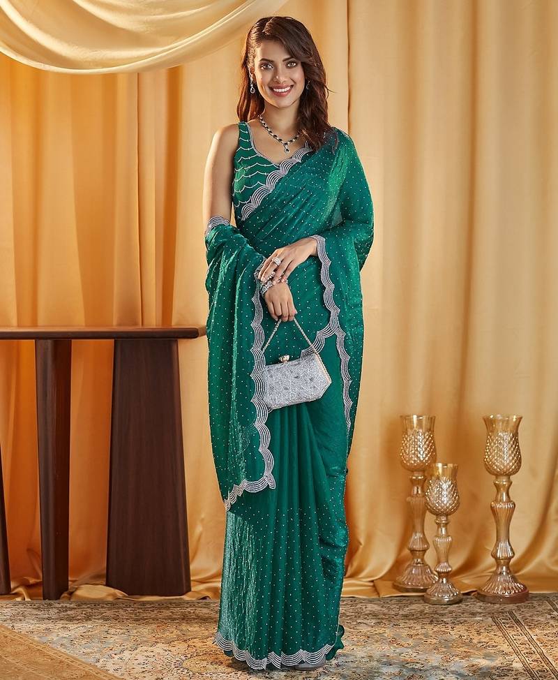 Teal beads and stones embellished silk blend saree