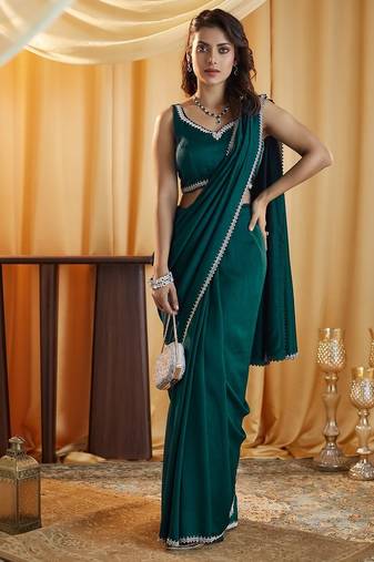 Turquoise blue beads and stones silk blend blend saree
