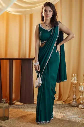 Turquoise blue beads and stones silk blend blend saree