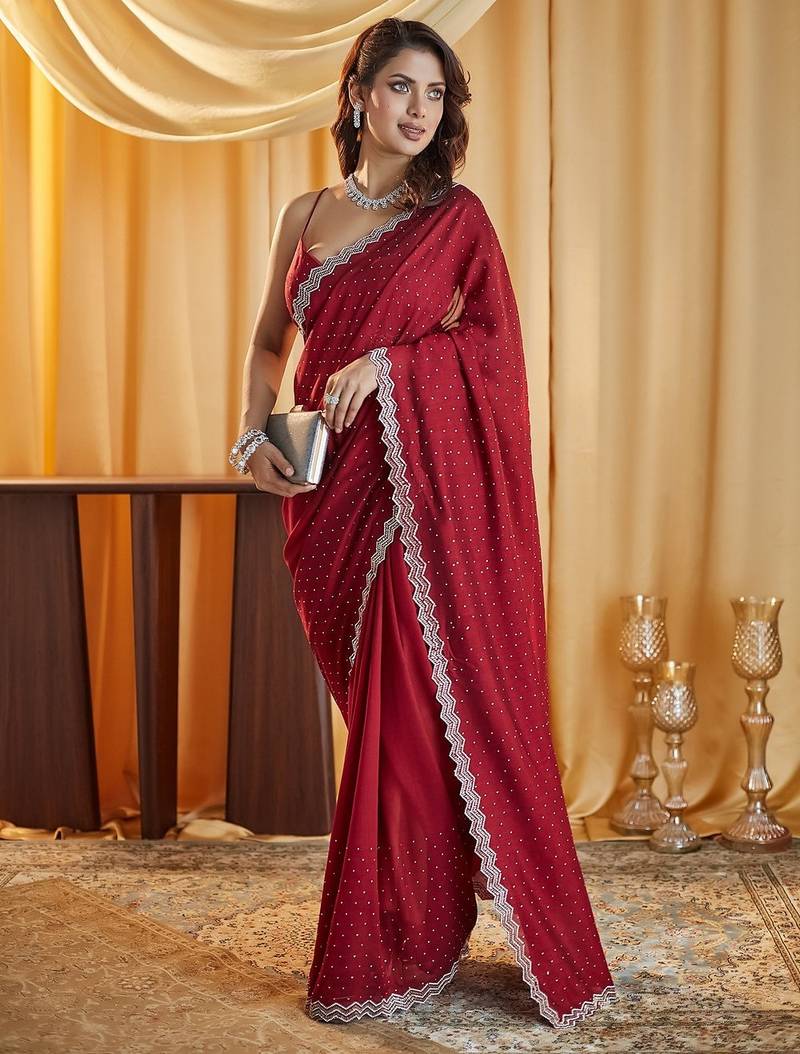 Marron women beads and stones embellished saree