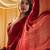 Marron women beads and stones embellished saree