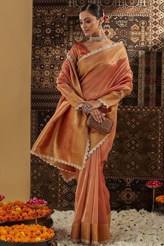 Peach woven embellished saree