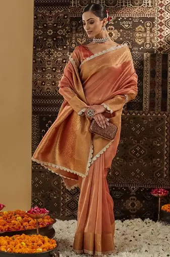 Peach woven embellished saree