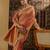 Peach woven embellished saree