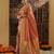 Peach woven embellished saree