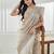Gold floral beads and stones embellished net saree