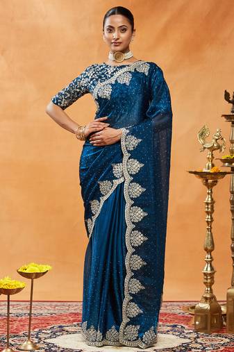Turquoise blue embroidered saree