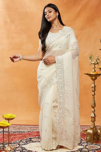 Cream embroidered chiffon saree