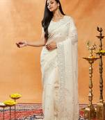 Cream embroidered chiffon saree