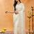 Cream embroidered chiffon saree