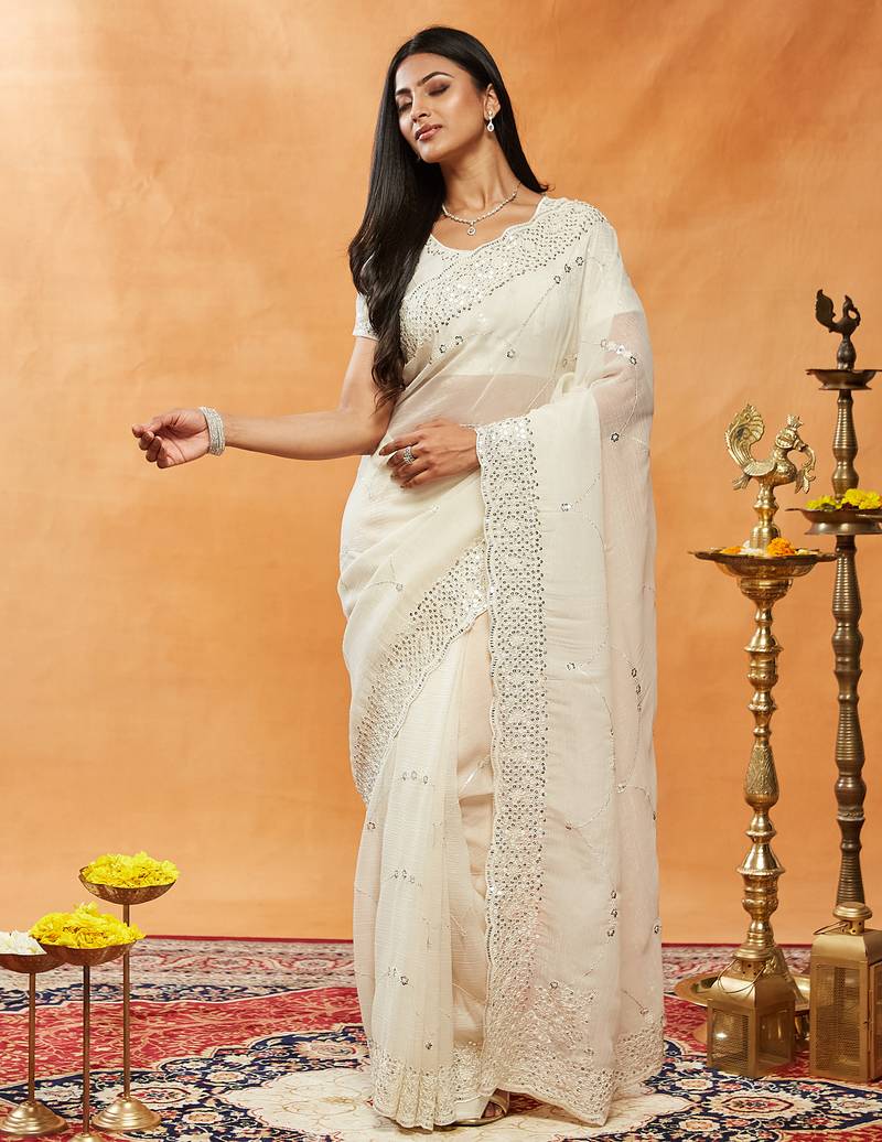 Cream embroidered chiffon saree