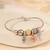 Silver trinklet charm kada