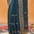 Turquoise blue embroidered chiffon saree