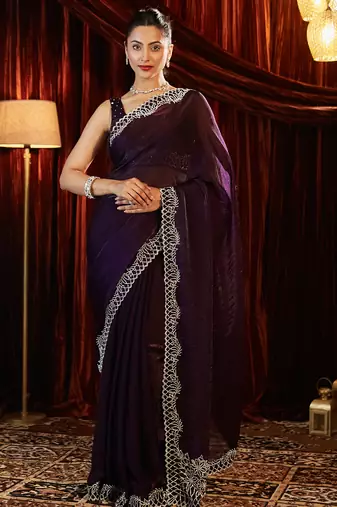 Purple embellished border saree with blouse piece