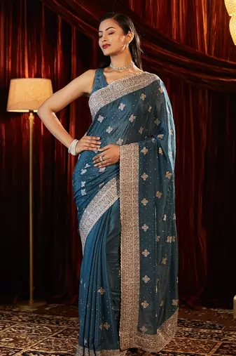 Turquoise blue embroidered chiffon saree